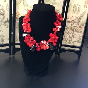 Chunky real red, coral statement, piece necklace.